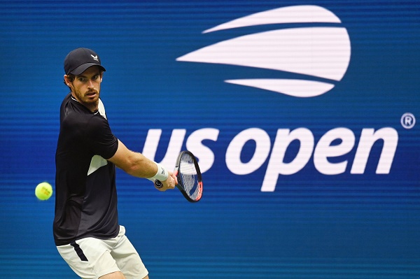 Andy Murray leans into a backhand