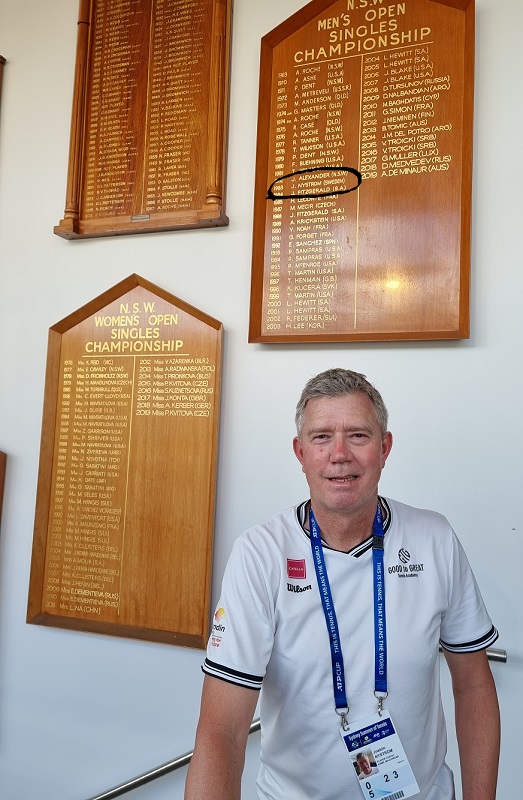 Nystrom in front of the Sydney honour boards