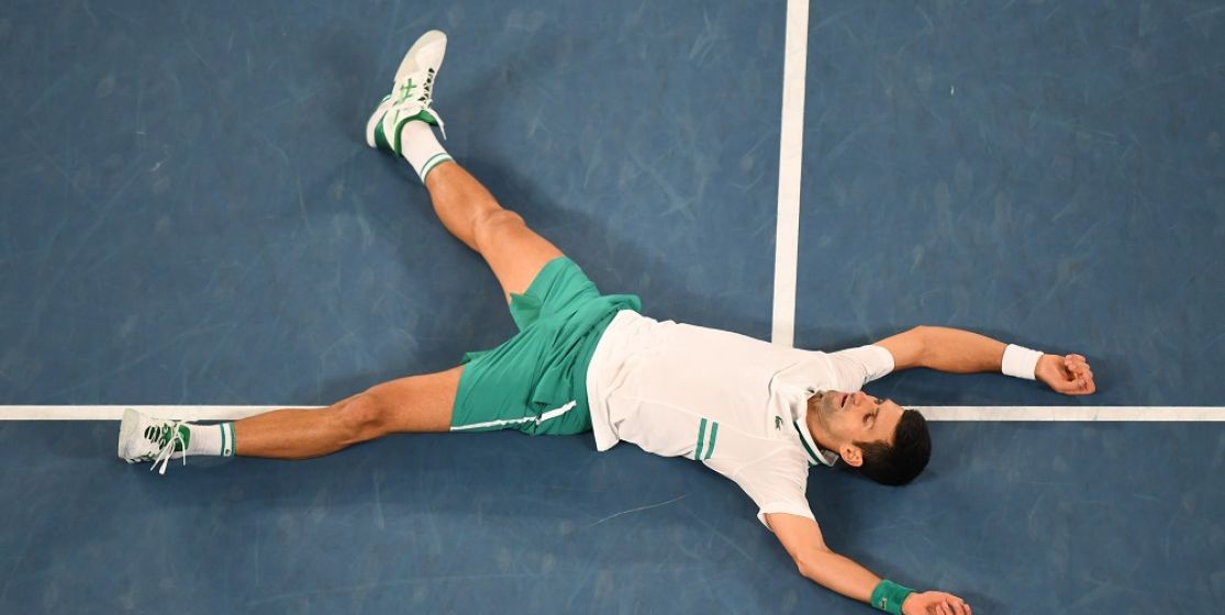 Novak Djokovic celebrates his Australian Open win to start the year