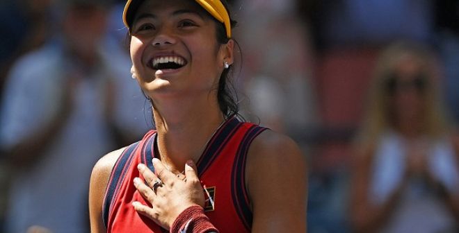 Emma Raducanu beams after a win